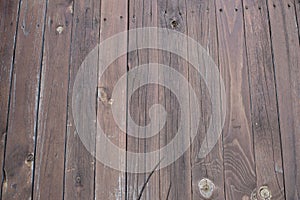 Old brown barn wood parquet background texture with scratches and cracks close up