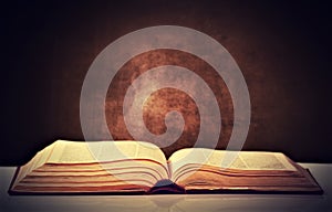 Old brown book opened