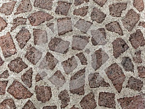 Old brown concrete with brick pavement.