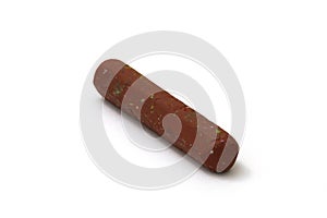 Old brown crayon on white background