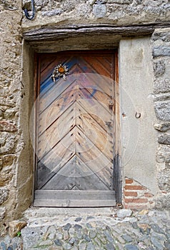 Old brown door of a medieval house