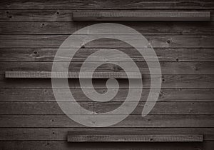 Old brown empty shelf on wooden wall