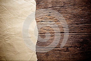 Old brown paper on wood