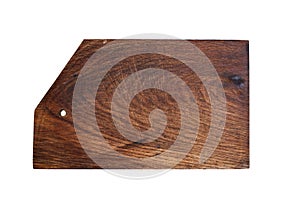 Old brown rectangular wooden kitchen cutting board