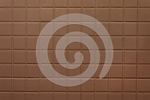 Old brown tile wall background