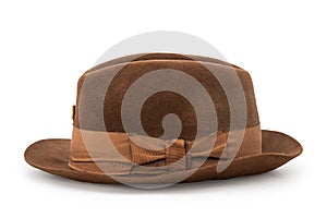 Old brown trilby hat isolated on white background with clipping path