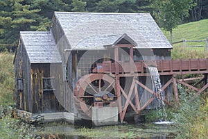 An old brown water mill