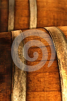 Old brown wooden barrel of sherry