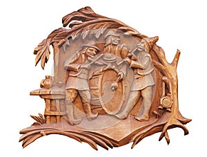 Old brown wooden bass-relief with musicians isolated over white