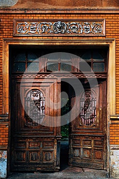 Old brown wooden door in Petrovaradin, Serbia photo