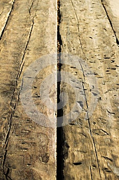 Old brown wooden table with aged marks