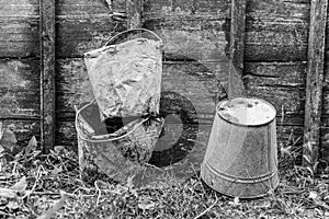 Old buckets stained in cement