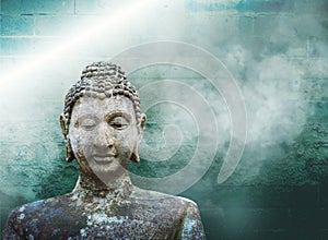 Old buddha sculpture over abstract background, buddhism symbol