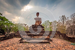 Old buddha statue in the Kamphaeng Phet Historical Park, Thailand. - (Selective focus)