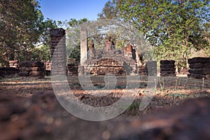 Old buddha statue in the Kamphaeng Phet Historical Park, Thailand. - (Shallow of focus)