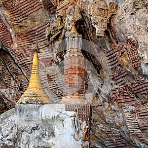 Old buddhist pagoda with carvings in Kaw Goon.