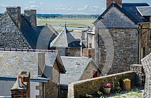 Old buidings and roofs in the town of le mont saint michel of france photo
