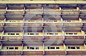 The old building with a balcony view from below