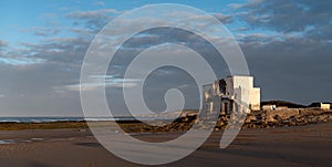 Old building at coast of Sidi Kaouki, Morocco, Africa. Sunset time. morocco`s wonderfully surf town