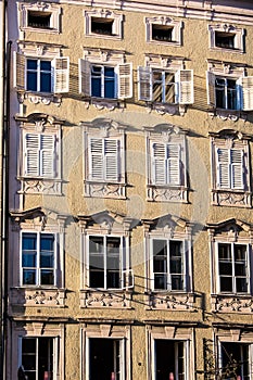 Old building, facade with lattice windows photo