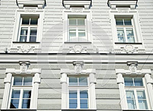 An old building facade with six windows