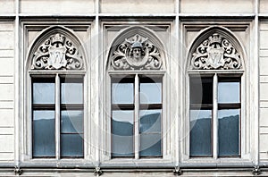 Old building facade with three windows