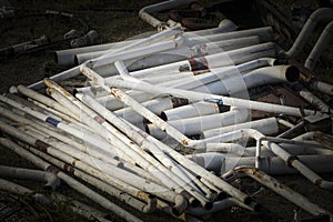 Old building pipes and tubes ready for recycling after dismantling from architectural projectâ€™s