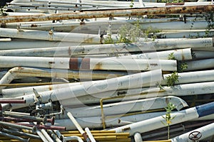 Old building pipes and tubes ready for recycling after dismantling from architectural projectâ€™s