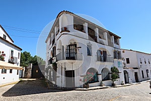 Old building in Pozo de la Nieve street. Aracena, Huelva, Spain photo