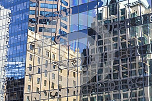 Old Building Reflections in Windows of Modern Office