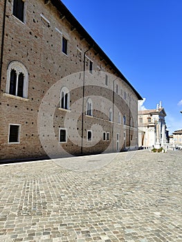 Old building, Square of Rinascimento in Urbino Italy on a sunny day photo