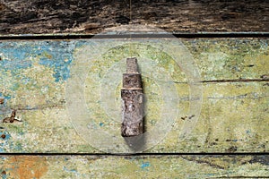 Old Building Tool Plummet on Wood background
