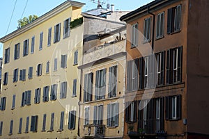 Old buildings along via Canonica in Milan, Italy