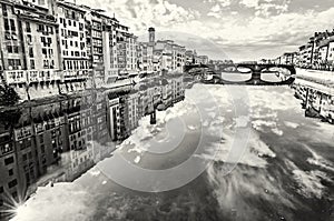 Old buildings and beautiful Ponte Santa Trinita mirrored in the