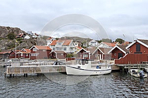 Old buildings and boats at the skerry coast near Bovallastrand Sweden