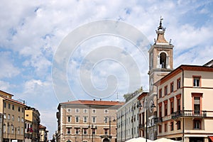 Old buildings and clock tower Piazza Tre Martiri Rimini photo