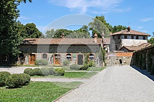 Old buildings in courtyard of ancient castle in Grazzano Visconti, Italy