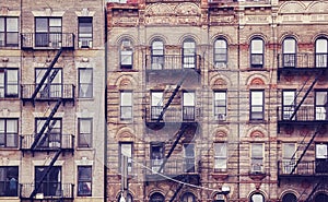 Old buildings with fire escapes in New York City.