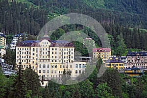 Old buildings in the forest on the mountain Bad Gastein