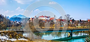 Old buildings of Fussen city. St. Mang Basilica, High Castle. Fussen, Germany. Panorama