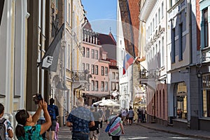 Old buildings and tourists at the Old Town in Tallinn