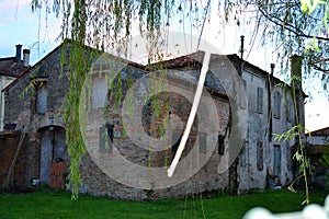 old buildings, Oriago, for restoration, shutters photo