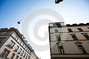 Old buildings renovated in Munich, blue sky