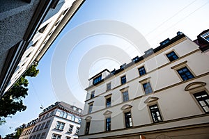 Old buildings renovated in Munich, blue sky