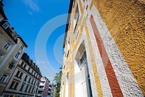 Old buildings renovated in Munich, blue sky