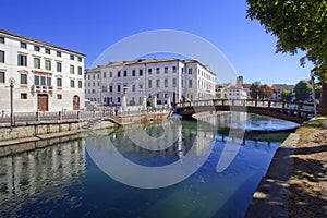 OLD BUILDINGS ON THE RIVER IN TREVISO CITY IN ITALY