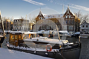 Old buildings and ships with snow