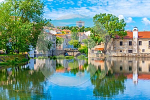 Old buildings in Viseu reflected on a local creek, Portugal photo