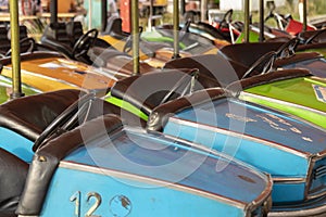 Old bumper cars from an amusement park.