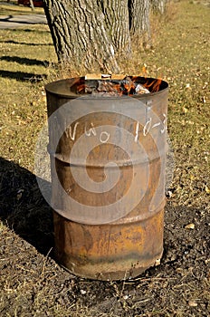 Old burn barrel for trash photo